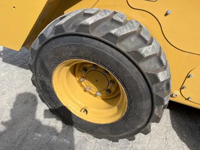 77057