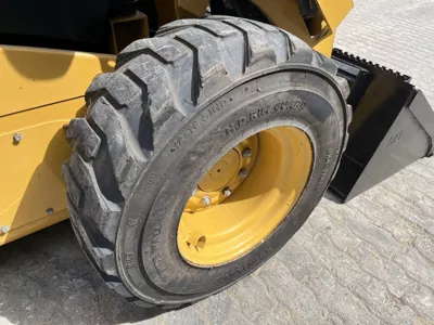 77057