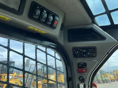 77057