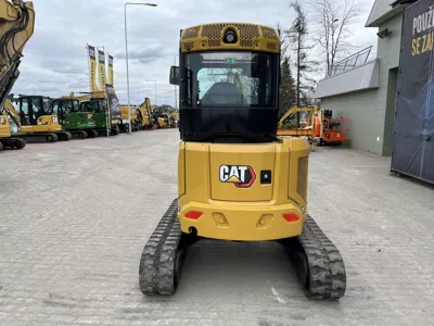 77067