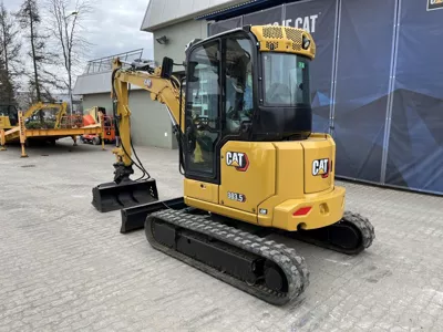 77067