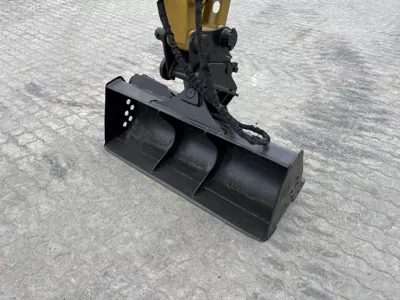 77067