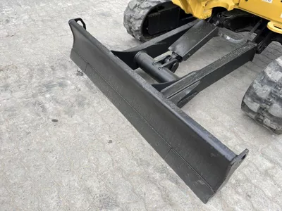 77067