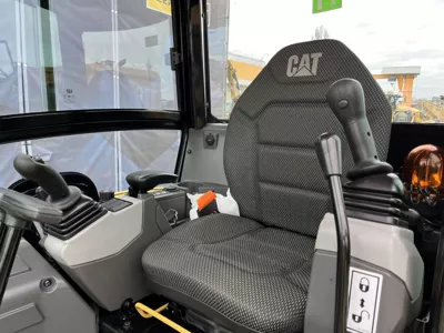 77067