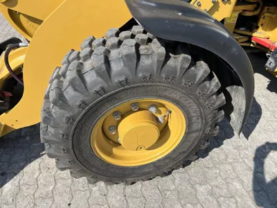 77075