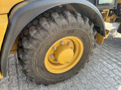 77075