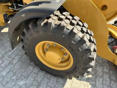 77075