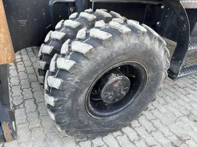 77046